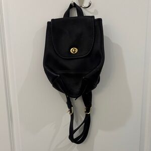 Coach Vintage Black Leather Backpack with Gold Accents